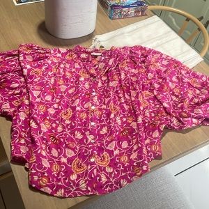 Beautiful print in in fuchsia and beige